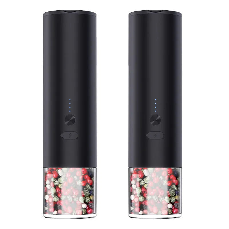 White and black electric salt and pepper grinders with USB charging ports and clear glass jars