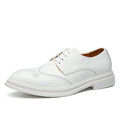 Men's white pointed-toe lace-up shoes with PU upper, flat square heel and rubber sole, sizes 38-48