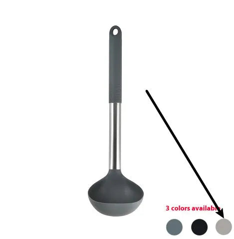 Silicone kitchen utensil set with twelve tools in a rotating white storage caddy on a counter.