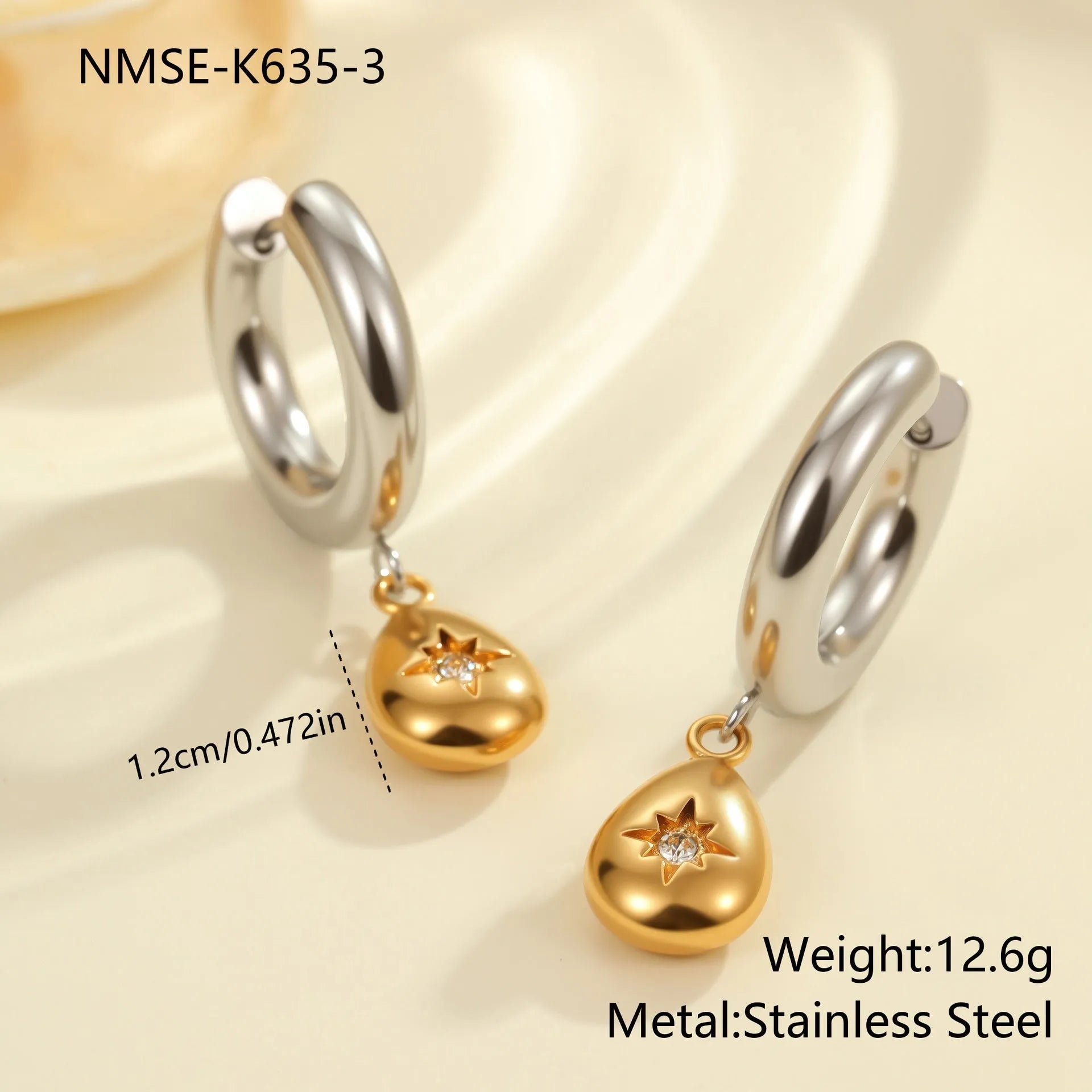 Women's stainless steel Christmas tree and heart earrings with electroplated finish showing geometric shapes