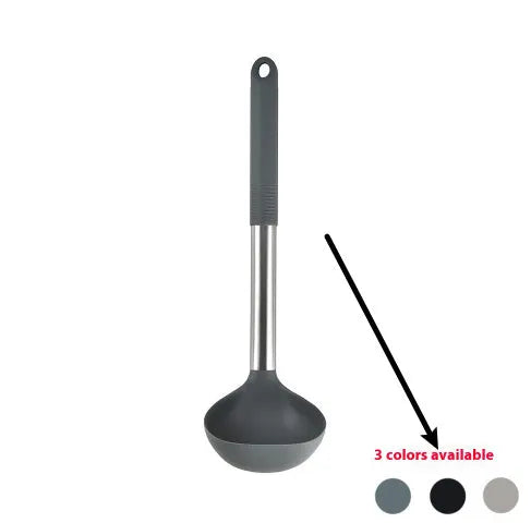 Silicone kitchen utensil set with twelve tools in a rotating white storage caddy on a counter.