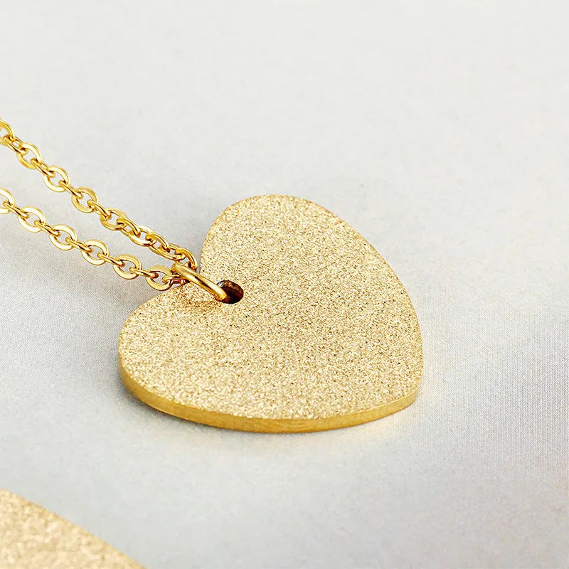 Geometric heart-shaped titanium steel necklace in silver colour with minimalist design