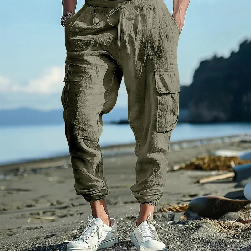 Men's casual linen trousers with ankle ties and multiple pockets in solid colour options