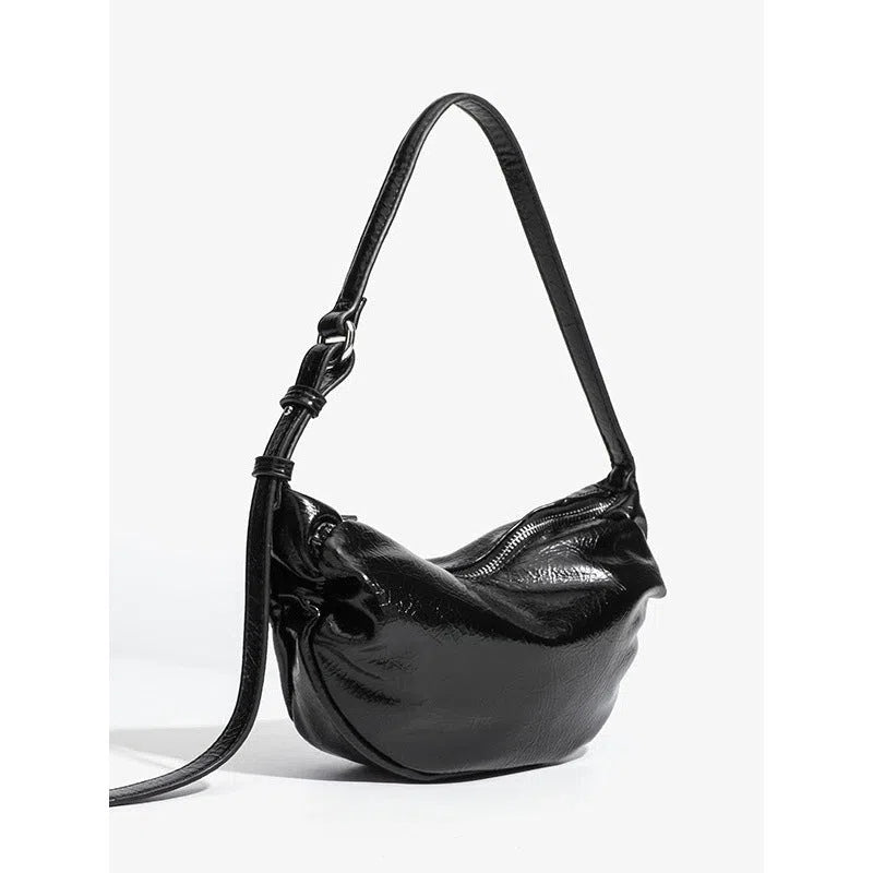 Black pleated dumpling-shaped PU shoulder bag with three-dimensional outer pocket and rock-and-roll style