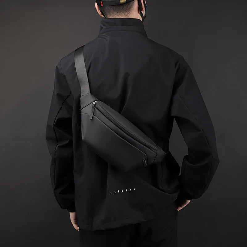 Outdoor casual sports crossbody bag in black nylon with stitching details, worn across chest