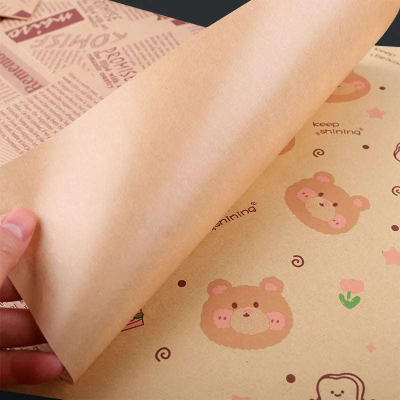 Microwaveable food grade anti-oil baking paper sheets, 28x38cm, in English, newspaper or retro kraft style, 50 or 100 pack