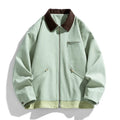 Mint green American retro-style loose men's jacket with dark contrast lapels and side seam pockets.