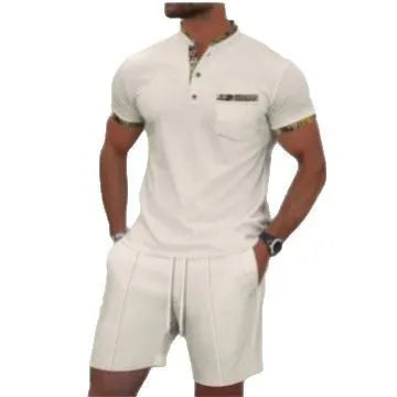 Man wearing a grey waffle texture short sleeve zip-up jacket and matching shorts from the suit set.
