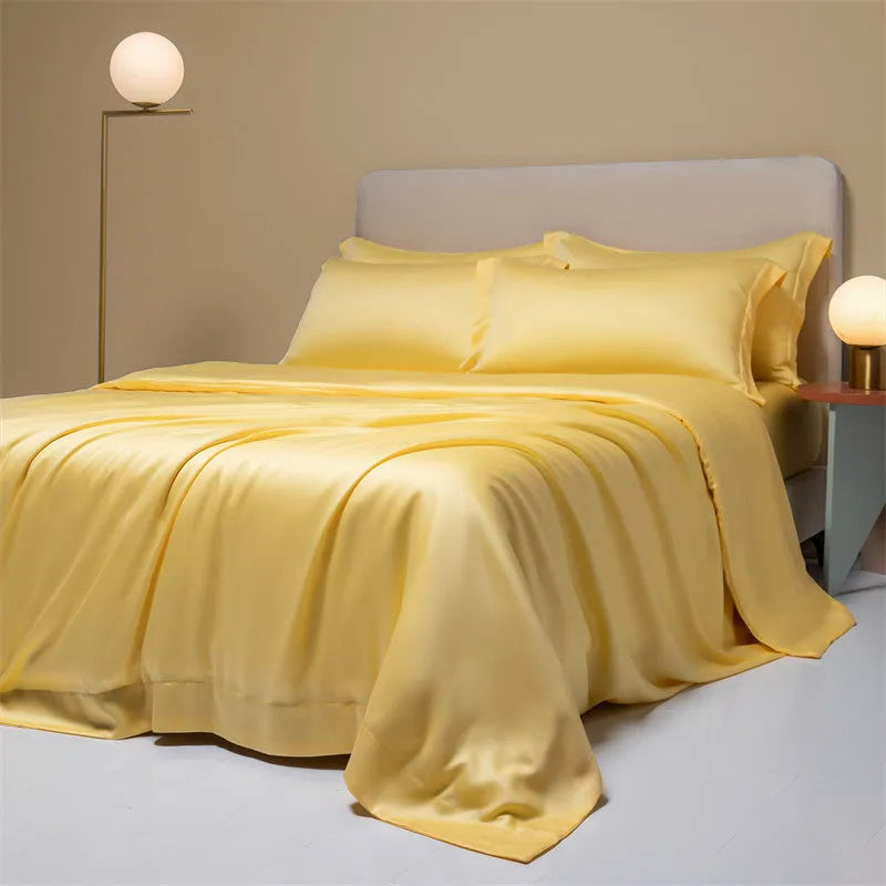 Luxury Lenzing Tencel duvet cover and pillowcase set in Aurora Blue colour on a modern bed.