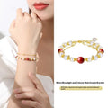 Sterling silver double layer bracelet with cinnabar red beans and white freshwater pearl charms