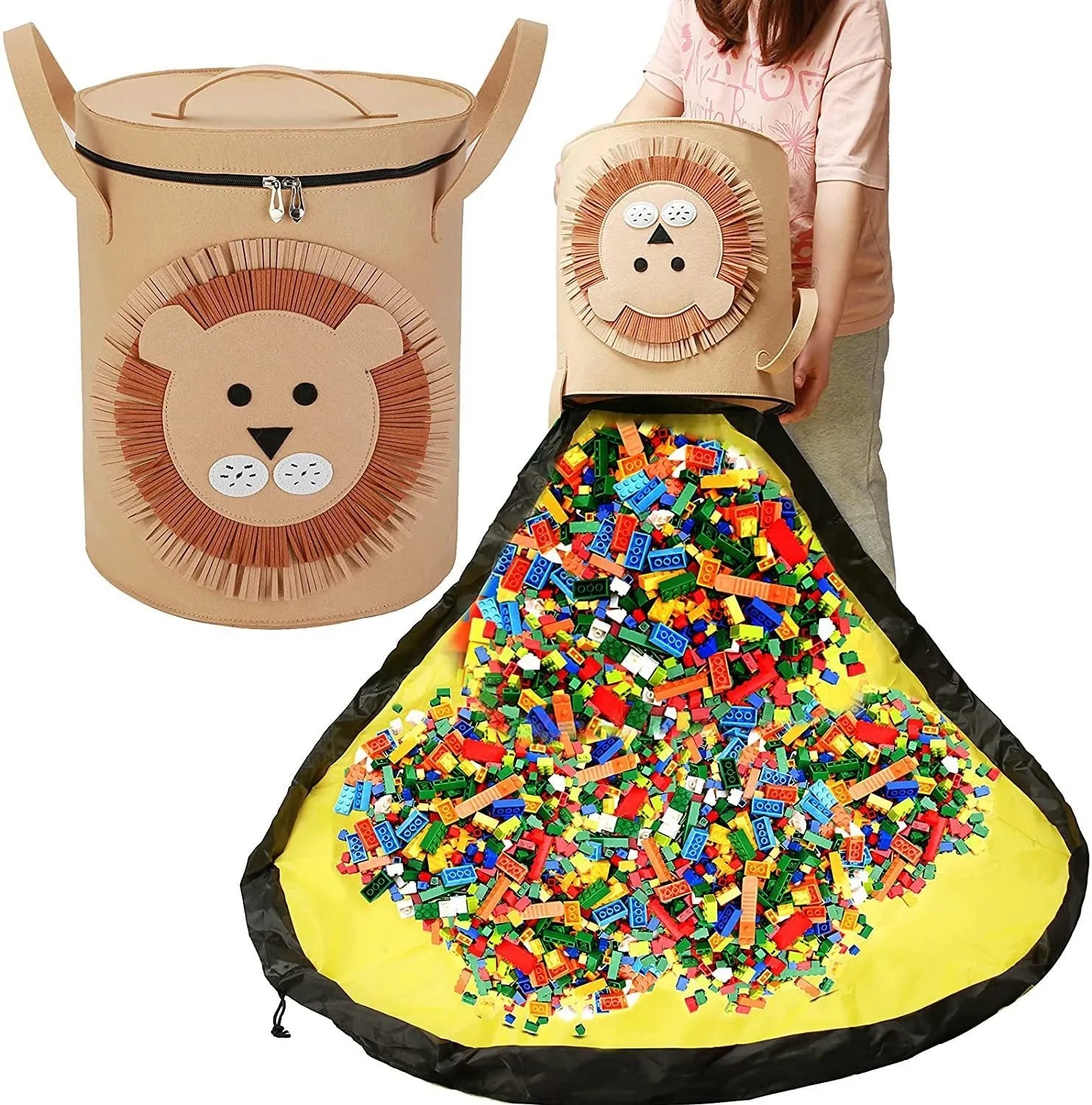 Green felt cube storage bag with pull rope, laid flat as a play mat next to toys.