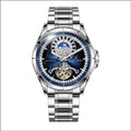 Men's silver and blue automatic waterproof mechanical watch with a stainless steel strap on a wrist