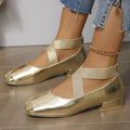 Gold slip-on overshoes with a square toe and low rubber heel, shown as shoe covers.
