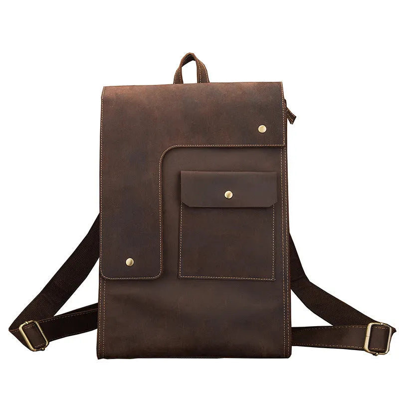 Dark brown genuine leather men's travel bag with shoulder straps and top handle.
