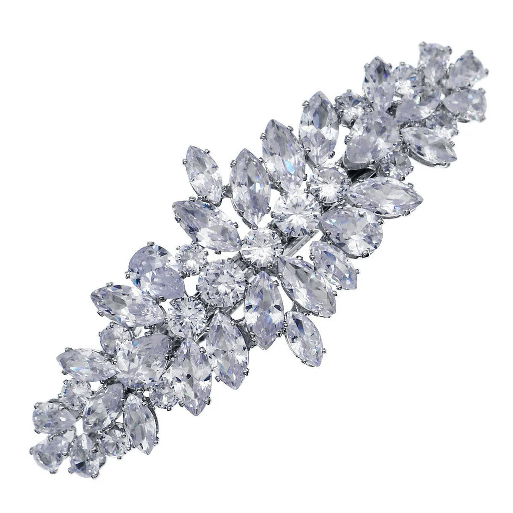 Women's inlaid zircon spring clip barrettes with electroplated leaf design on a neutral background