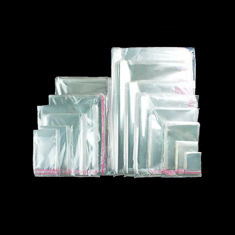 Transparent self-adhesive OPP bags, 7x10cm, with peel-and-seal closure, on a white background.