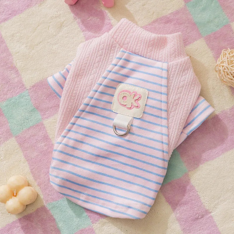 Cute striped dog shirt with metal belt loop, green and blue-green stripes, on a small dog