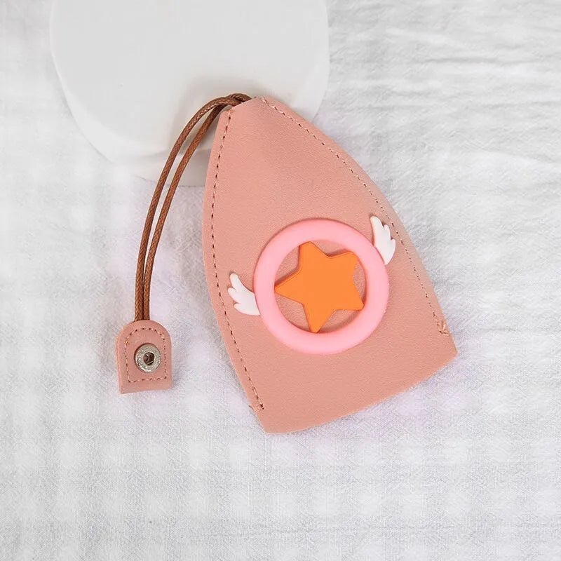 Colourful cartoon and resin design pull-out key case for car keys made from PU leather.
