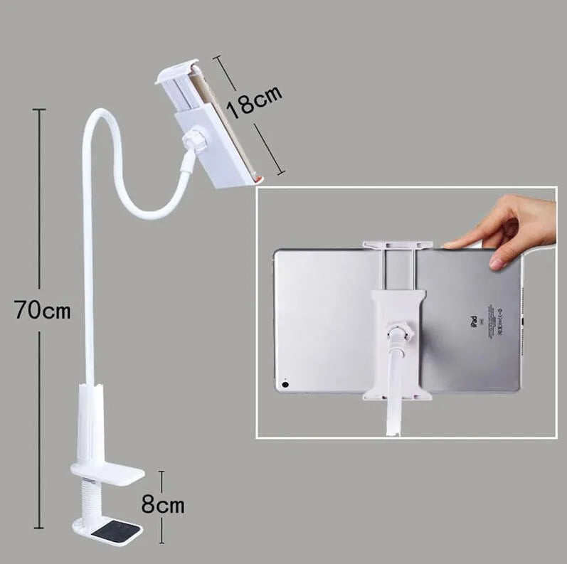Black bedside oversize phone stand with a long adjustable arm on a wooden table.