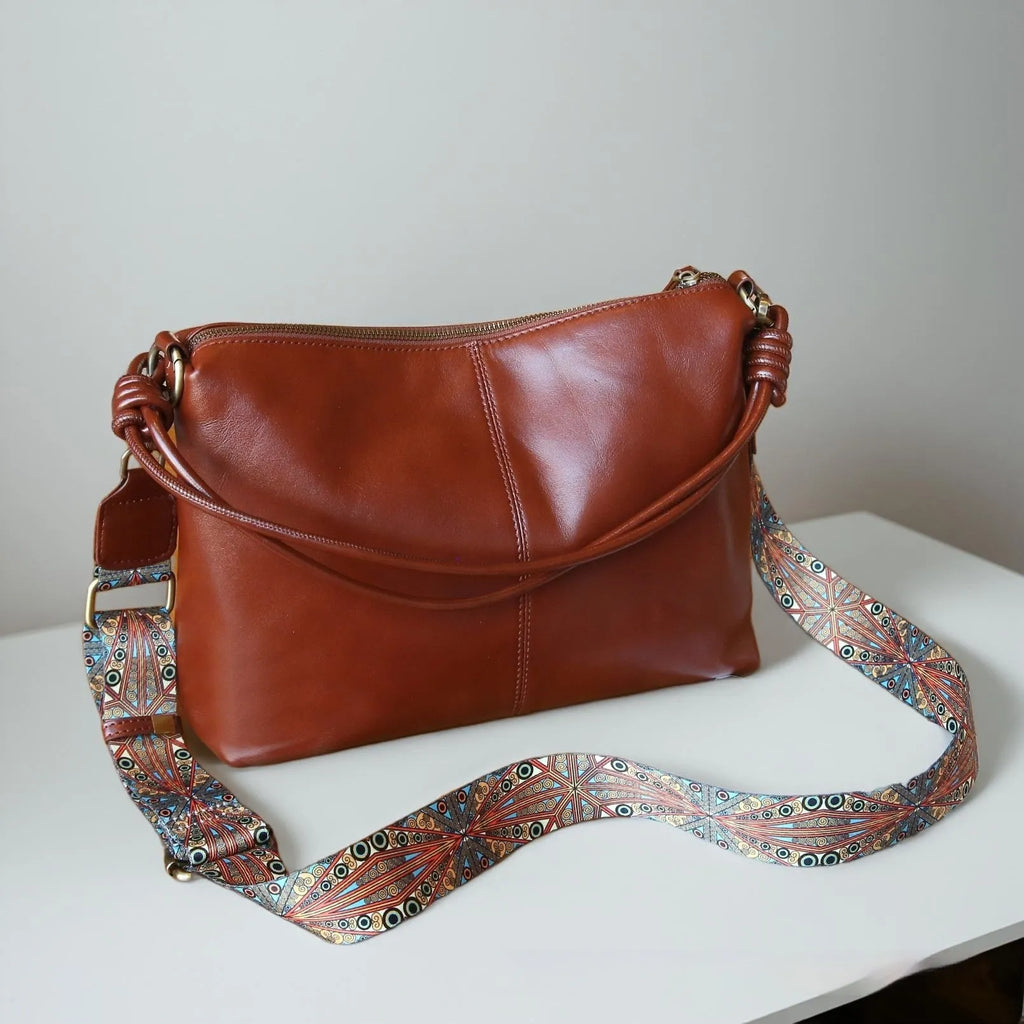 Genuine leather creative large capacity pillow-shaped shoulder bag in black with double straps and top grain leather finish