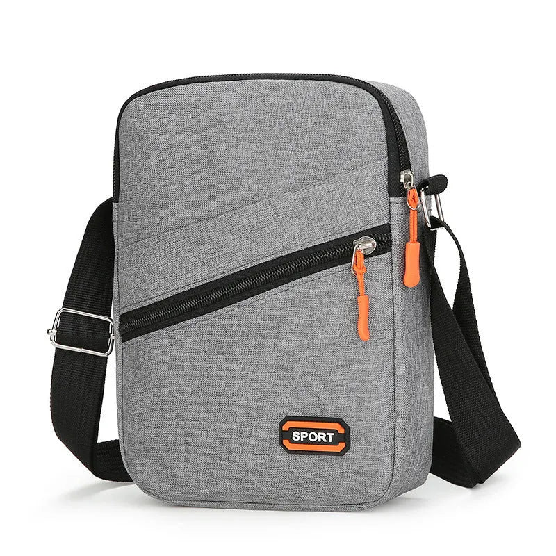 Oxford cloth crossbody commuter bag with contrast colour detailing in silver grey colour option