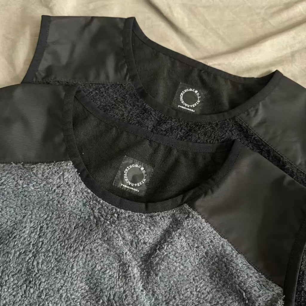 Men's lightweight fleece lined thermal vest in solid colour black, front view