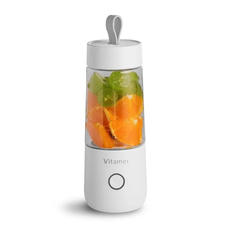 White portable USB blender with 350ml cup and silicone carry ring on a base.