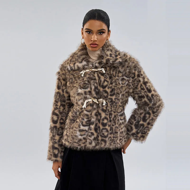 Women's leopard print polyester coat with a buckle lapel closure on a hanger.