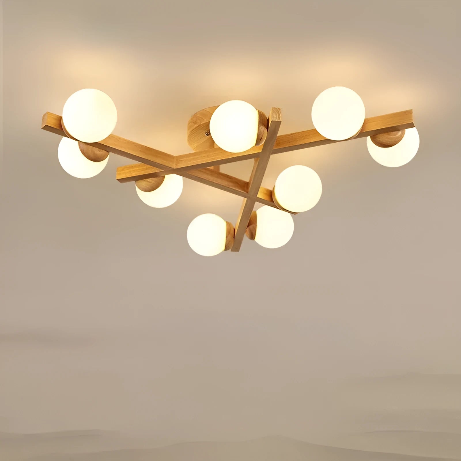 Nordic-style wooden effect ceiling light with three adjustable neutral white LED heads on angled arms.