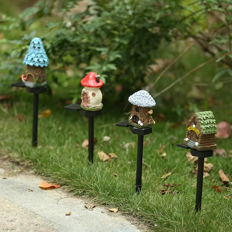 Solar-powered outdoor LED landscape light with flower-shaped resin house design and IP55 waterproof rating