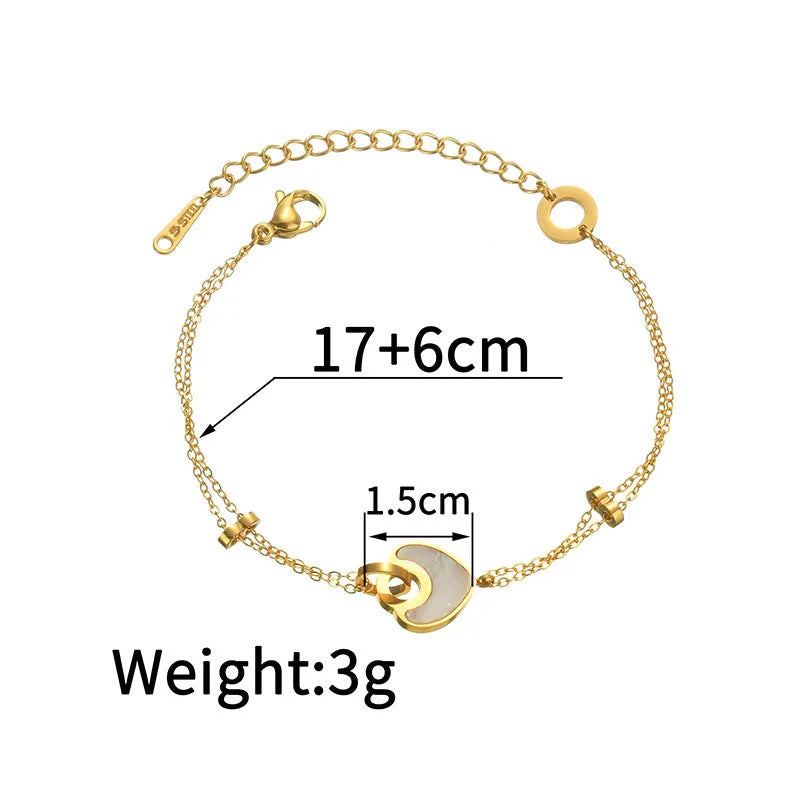 Women's stainless steel and resin bracelet with a double-layered heart charm.