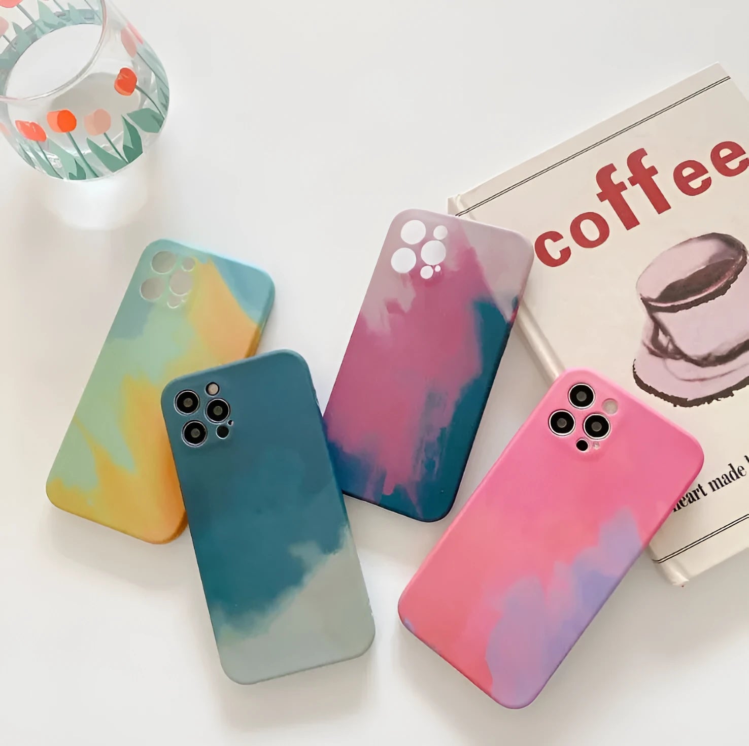 Soft silicone iPhone case with blue to purple oil painting gradient and abstract geometric pattern.