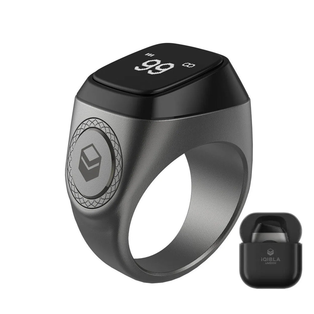Zikr1 metal smart ring for Tasbih counting on a finger, showing its OLED display and single button.