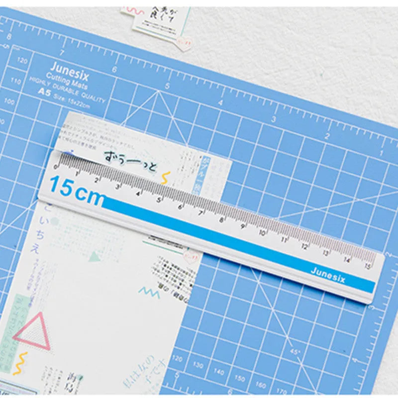 Art pen knife cutting board set with backing board, ruler, sharpener, and blade in blue colour