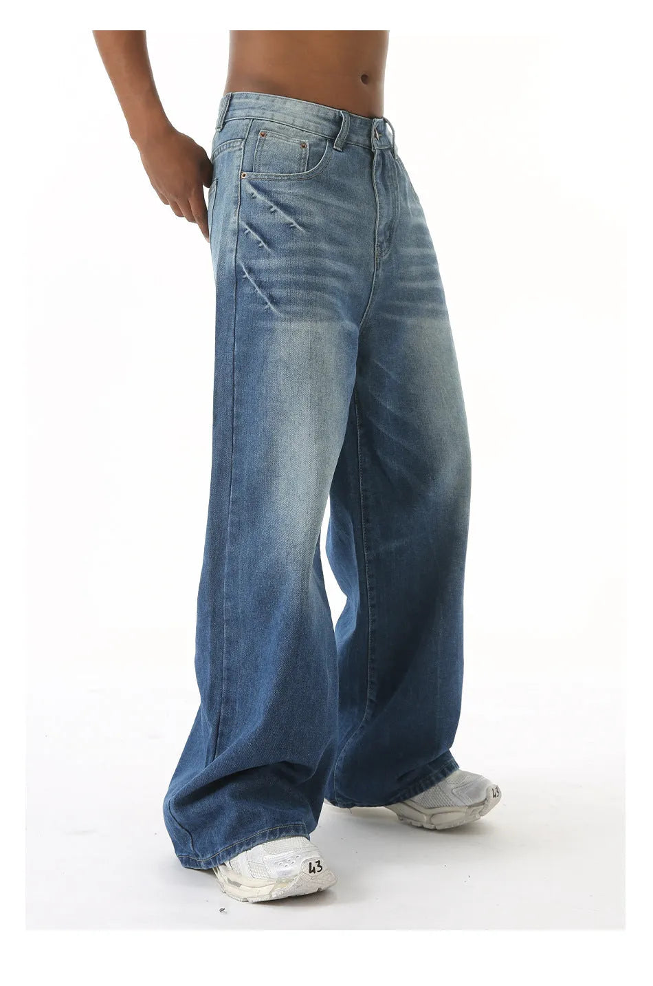 Retro washed light blue men's loose straight wide leg jeans with mid waist and zipper fly