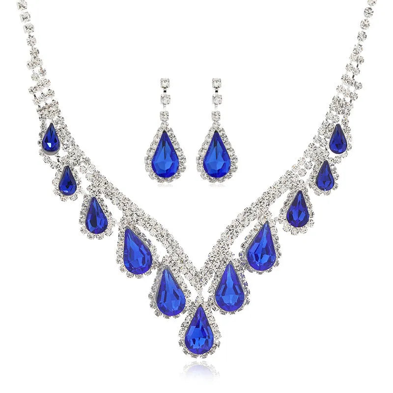 Sapphire blue alloy clavicle chain necklace and earrings set in Royal Blue White K finish on display