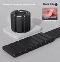 Silicone fitness bracelet with detachable weights and Velcro strap in black, blue, grey, or pink.