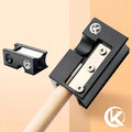 Matte black all-metal billiard cue leather tip repair tool on pool table