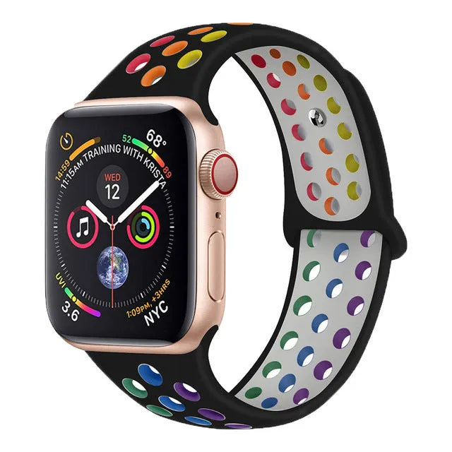 Silicone sports wristband with a single buckle closure shown in black, rainbow, and white colours.