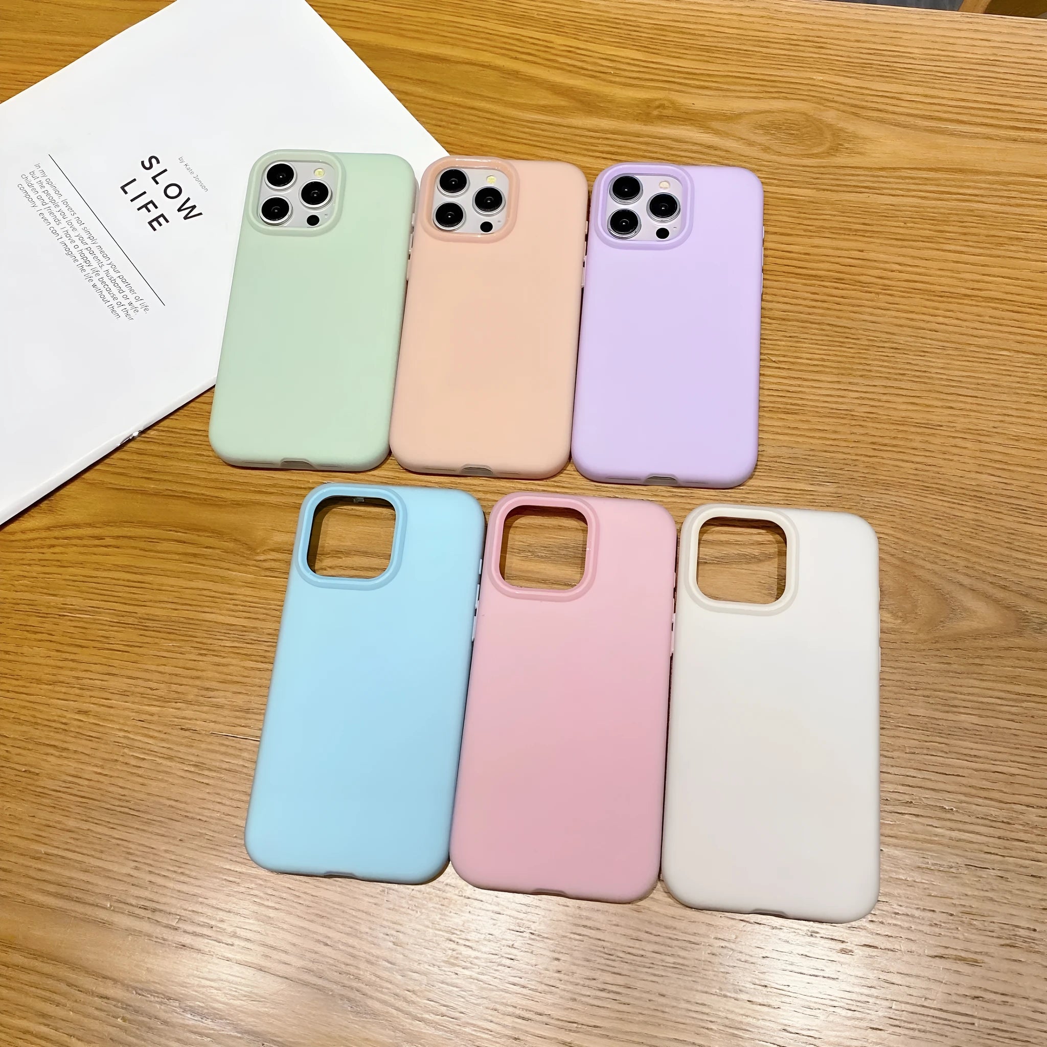 Liquid silicone dopamine phone case for Apple iPhone in blue, purple, and orange colour options