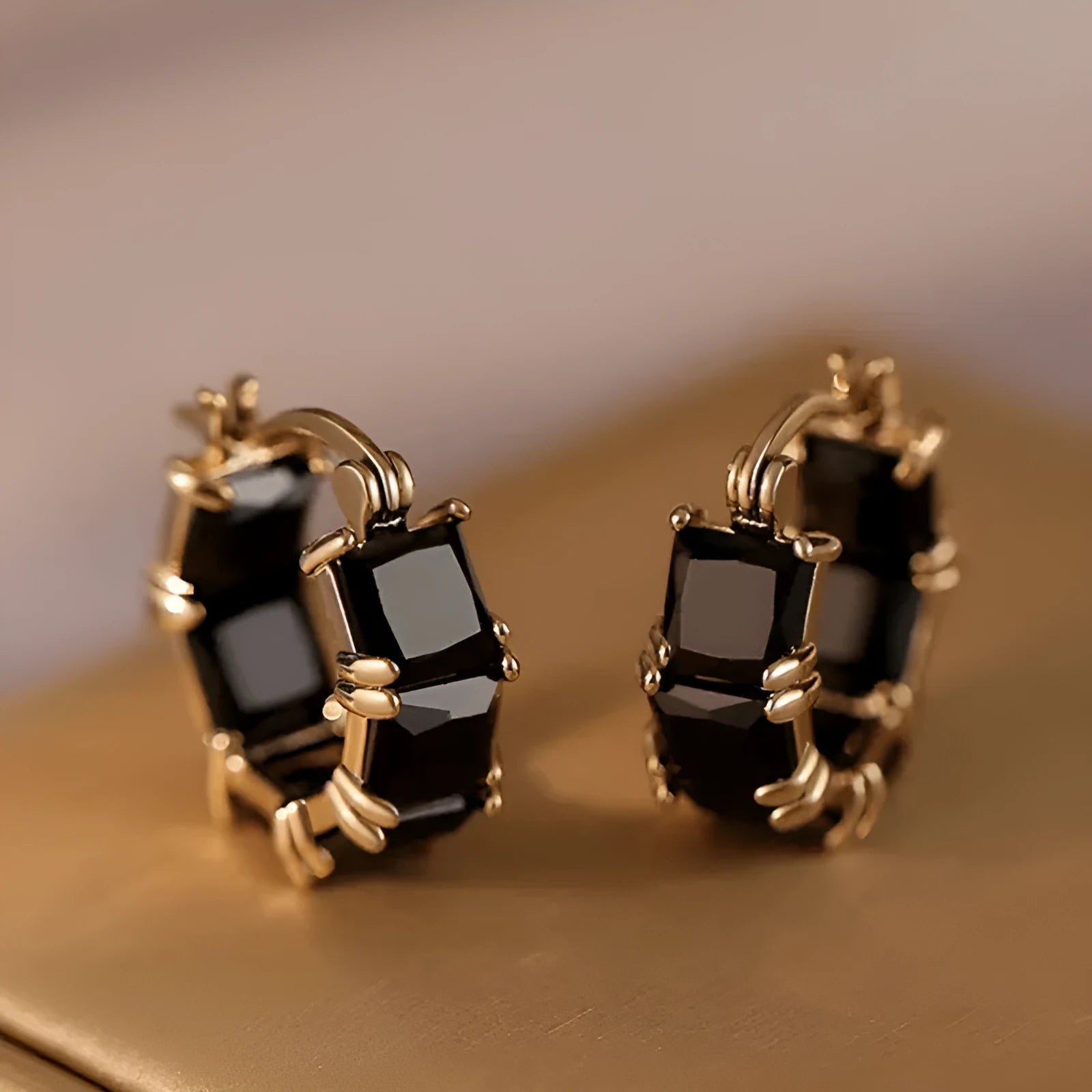 Women's geometric U-shaped earrings with crystal stones in gold electroplated copper