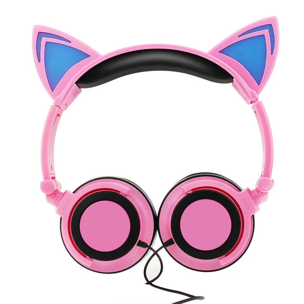 Colourful LED cat ear headphones showing illuminated ears and cushions on a black background