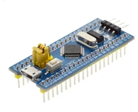 STM32F103C8T6 ARM Cortex-M3 development board showing microcontroller, Mini USB port, and connection headers