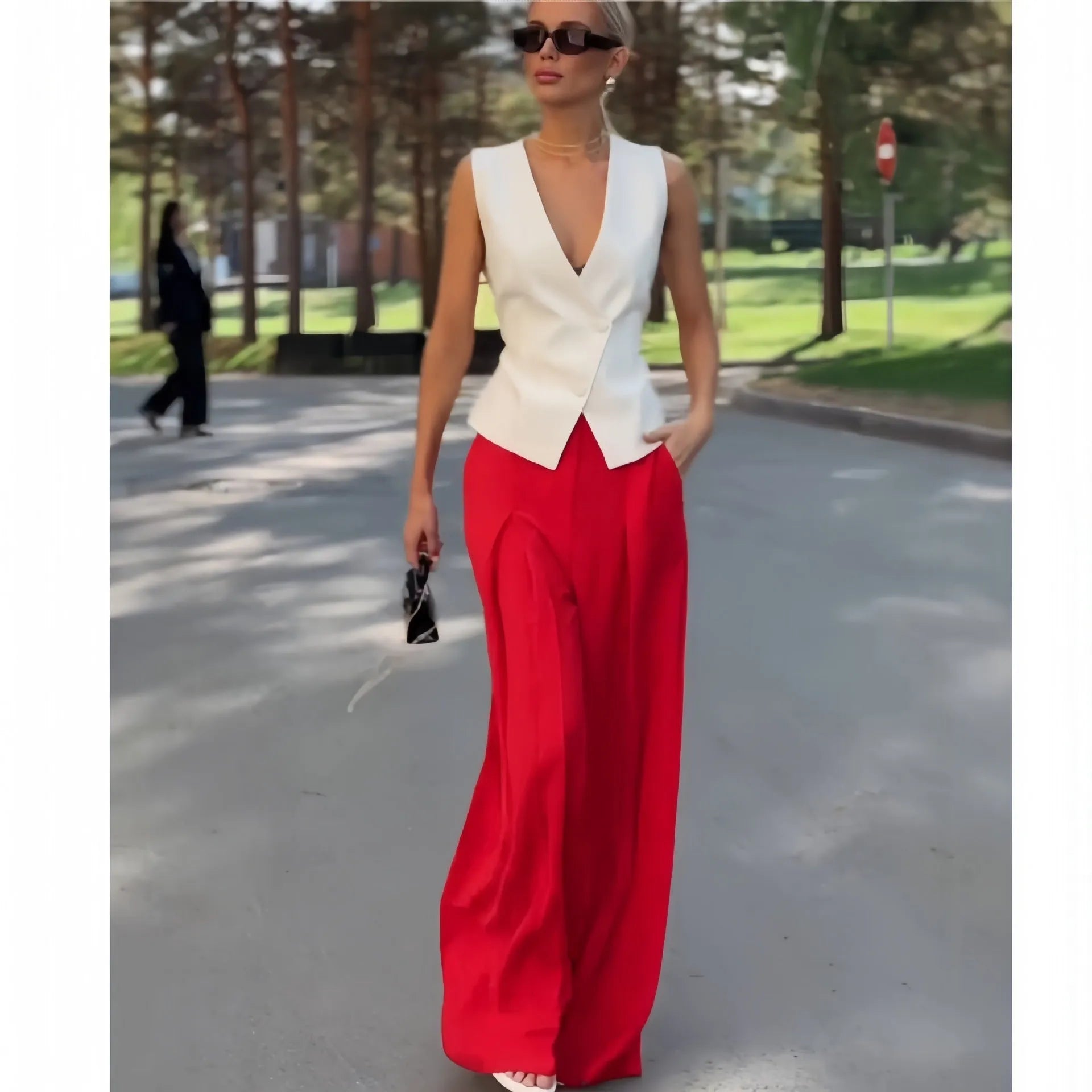 Women's deep V-neck sleeveless top and high waist wide leg pants two-piece set in beige polyester