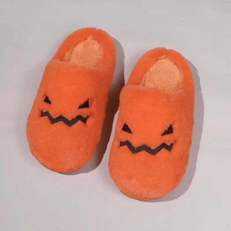 Orange pumpkin-shaped plush slippers with coral velvet upper on a non-slip PVC sole