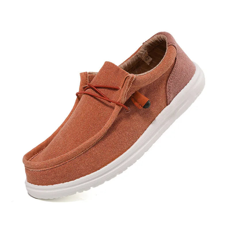 Men's casual canvas shoes with round toe and rubber sole in green colour with mosaic detailing