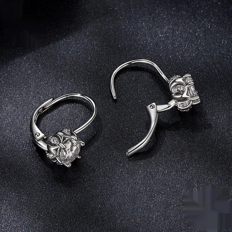 Sterling silver flower bud ear clip with moissanite stone and white gold plating