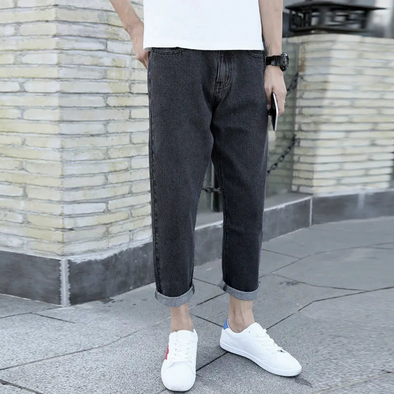 Men's loose straight fit cotton jeans in black or blue with harem trouser styling