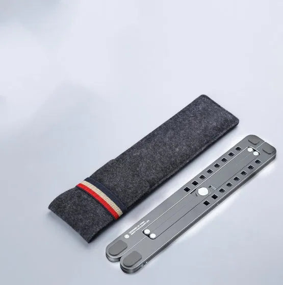 Aluminium foldable laptop stand shown in silver colour, adjusted to a mid-height position.