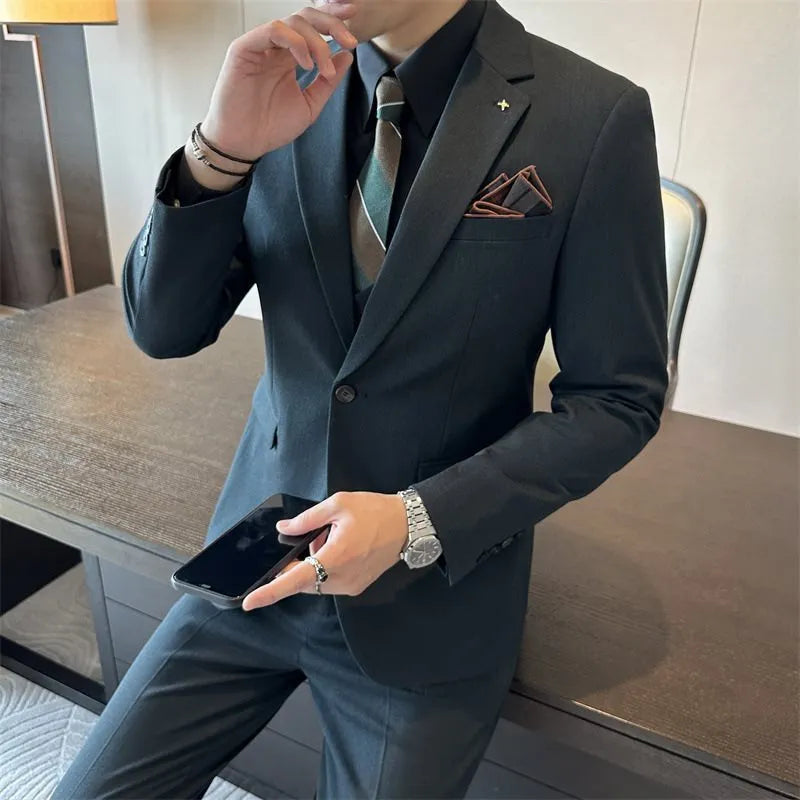 Men's slim fit business suit in a dark green chemical fibre blend fabric